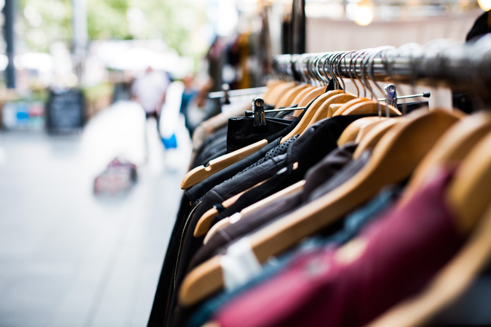 clothes on a hangar outside for sale