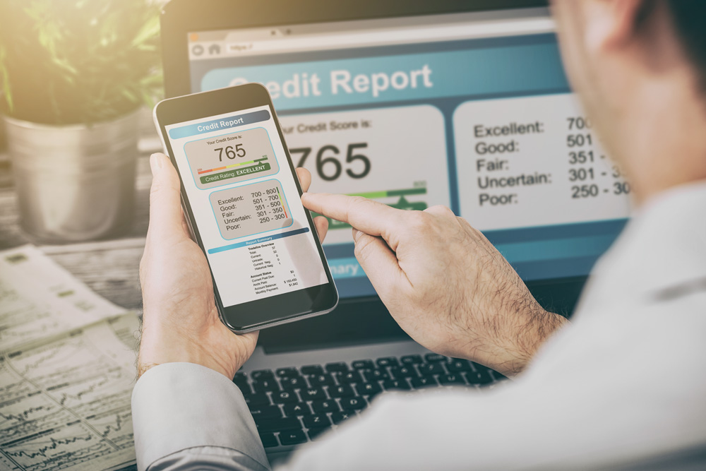 man viewing credit report