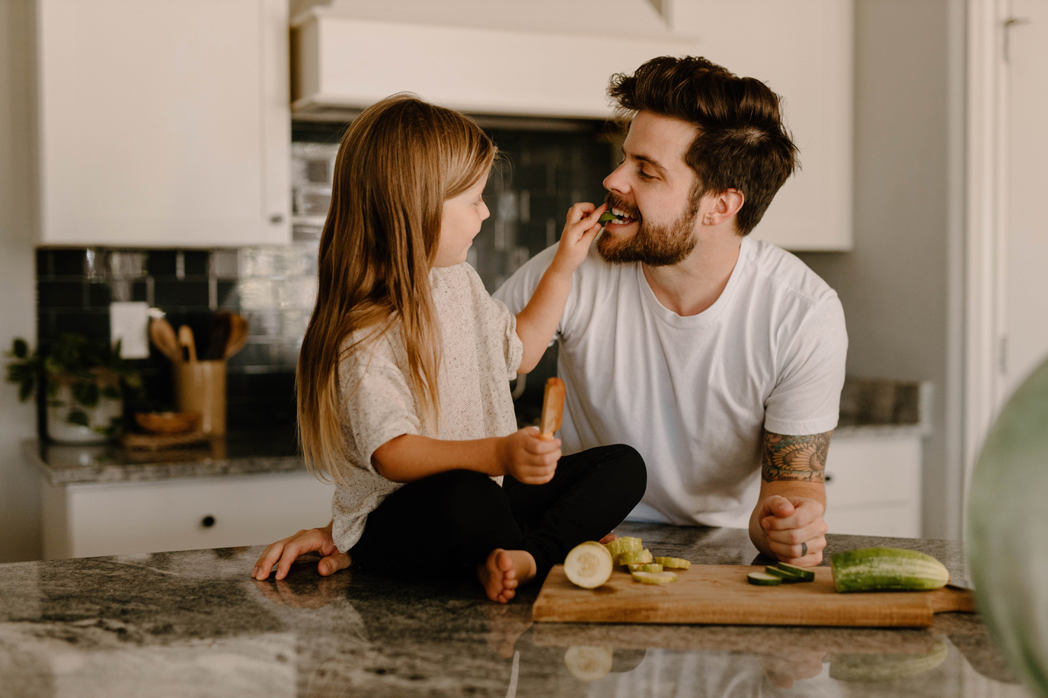 dad and daughter in the kitchen