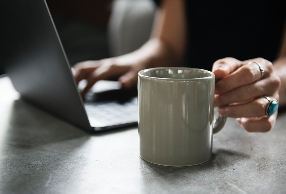 woman browsing internet on laptop