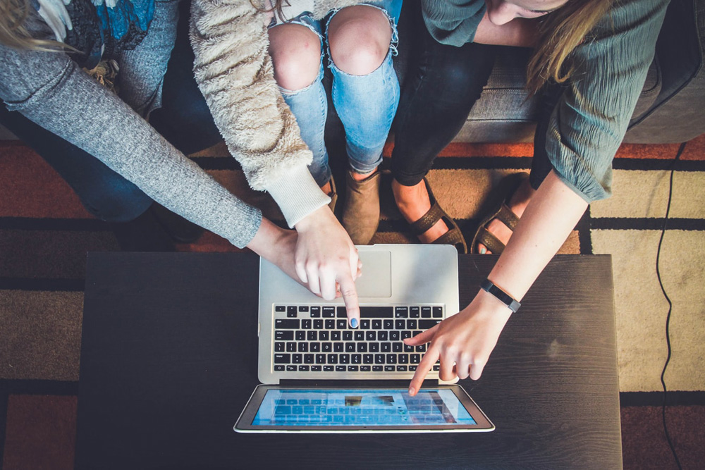 women coworking on laptop